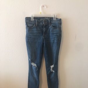 Blue high rise distressed jeans
